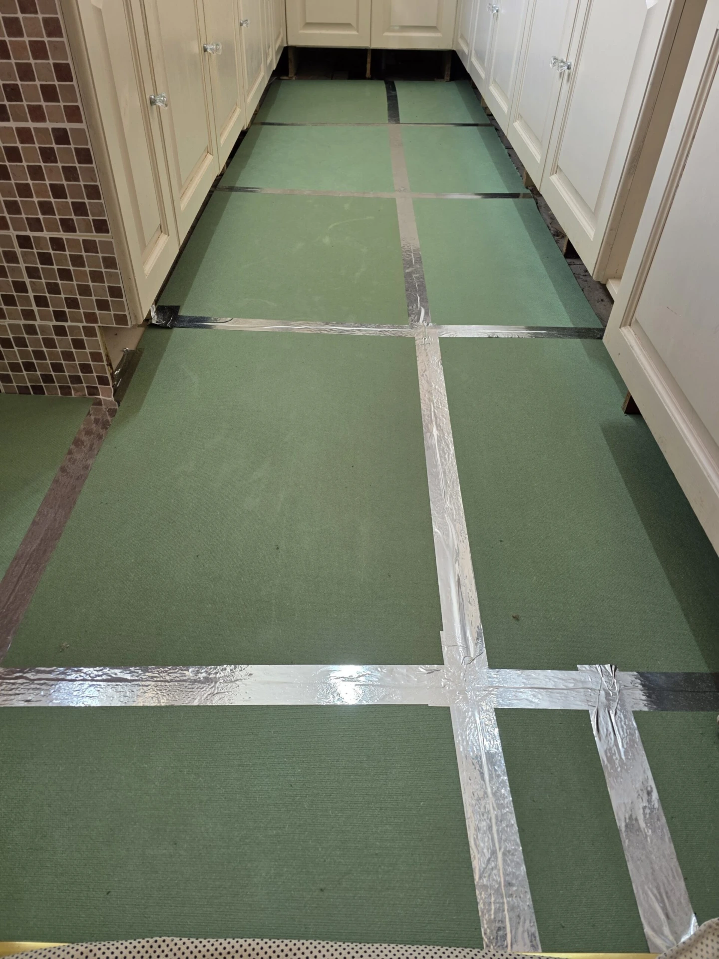 Laminate Flooring Replacement and Skirting Board Installation — work in progress photograph