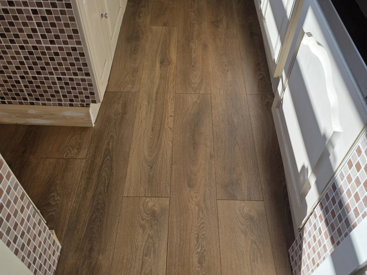 Laminate Flooring Replacement and Skirting Board Installation