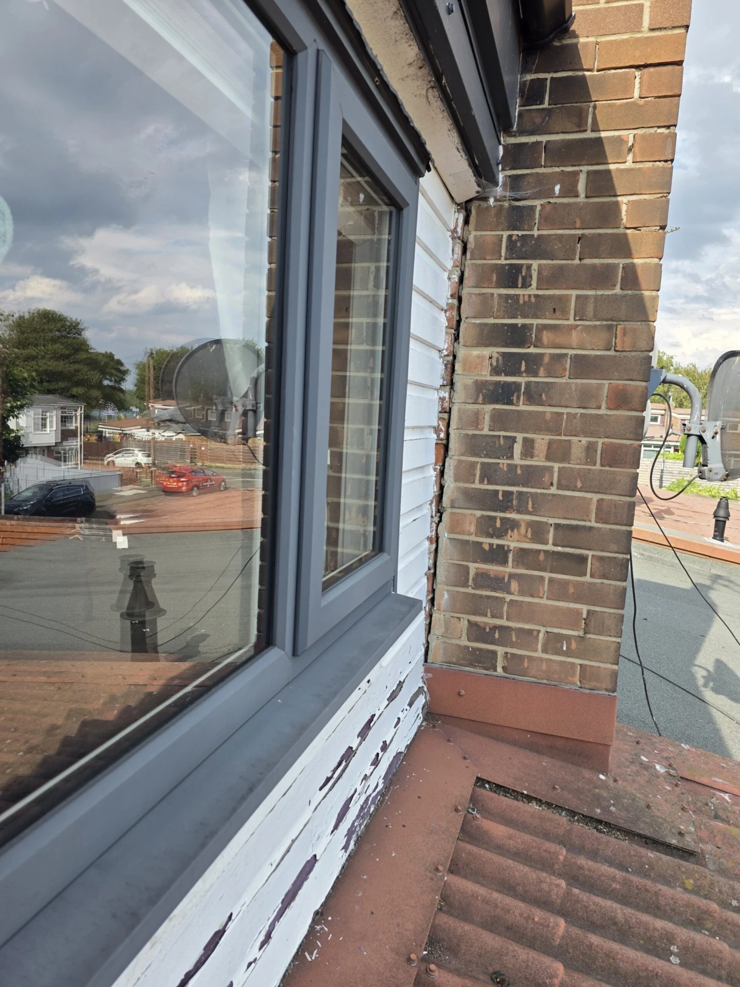 Replacement of Wooden Cladding with Anthracite Grey Composite Panels — before work started photograph