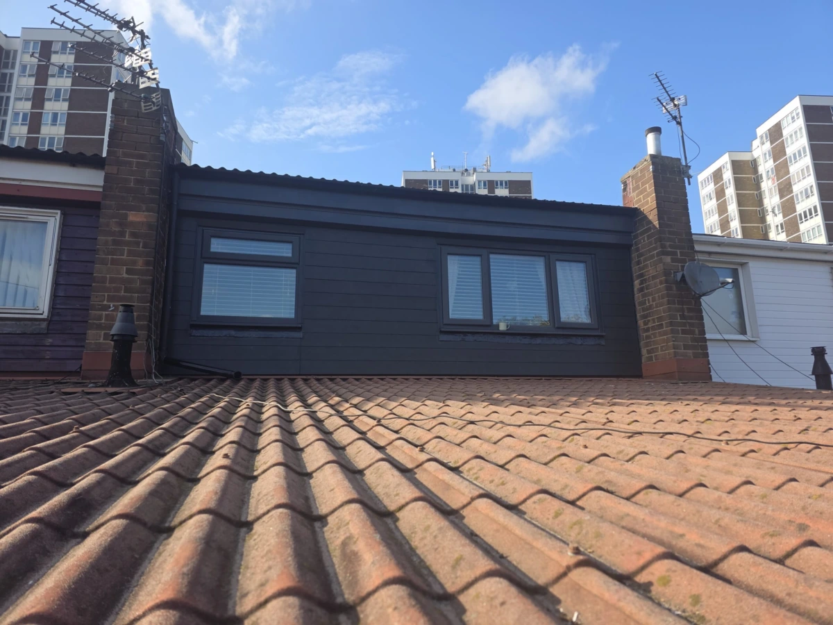 Replacement of Wooden Cladding with Anthracite Grey Composite Panels